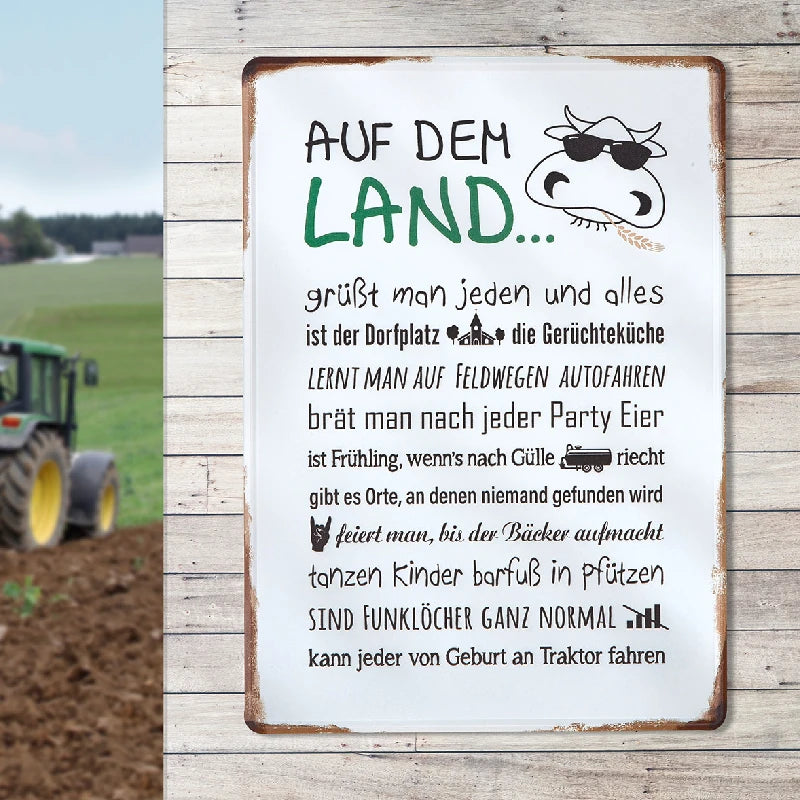 Blechschild "Landleben" mit Spruch und Kuhmotiv, Stimmungsbild