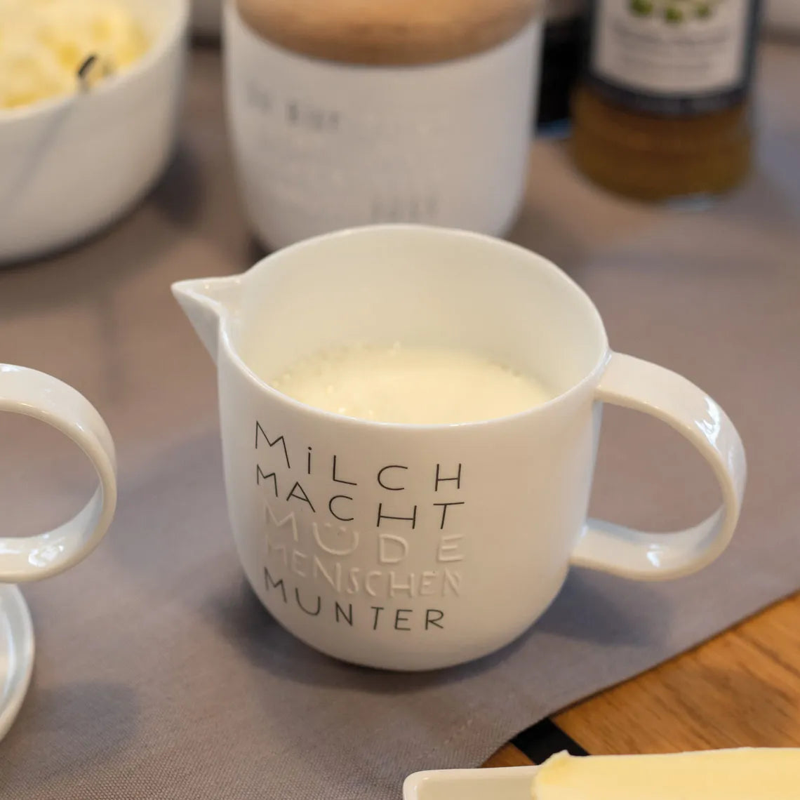 Milchkännchen "Milch macht munter" aus Porzellan