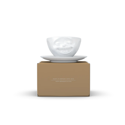 FiftyEight Kaffeetasse & Unterteller "Lachend" auf der Verpackung