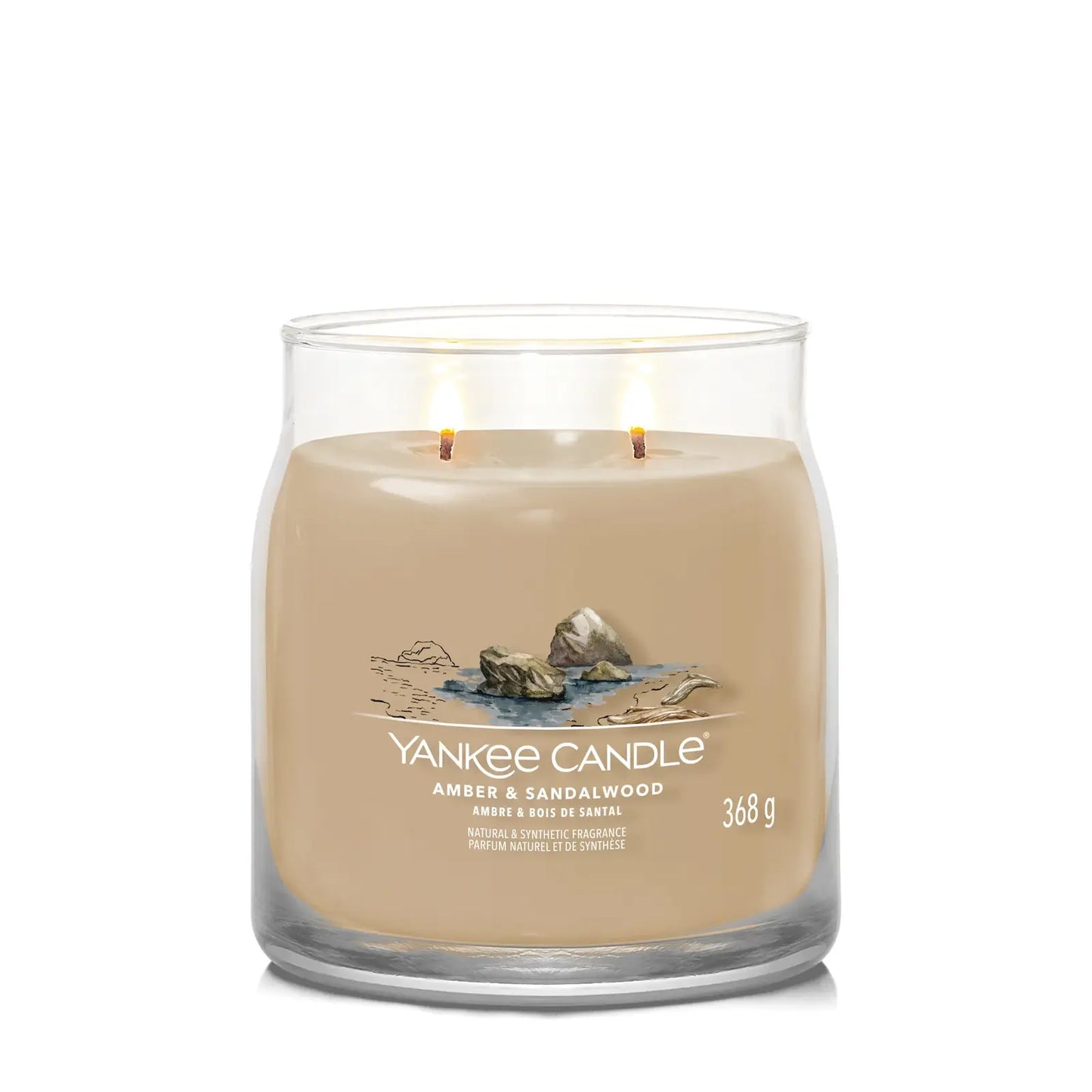 Yankee Candle Duftkerze - Amber & Sandalwood, Medium Glas mit brennenden Dochten