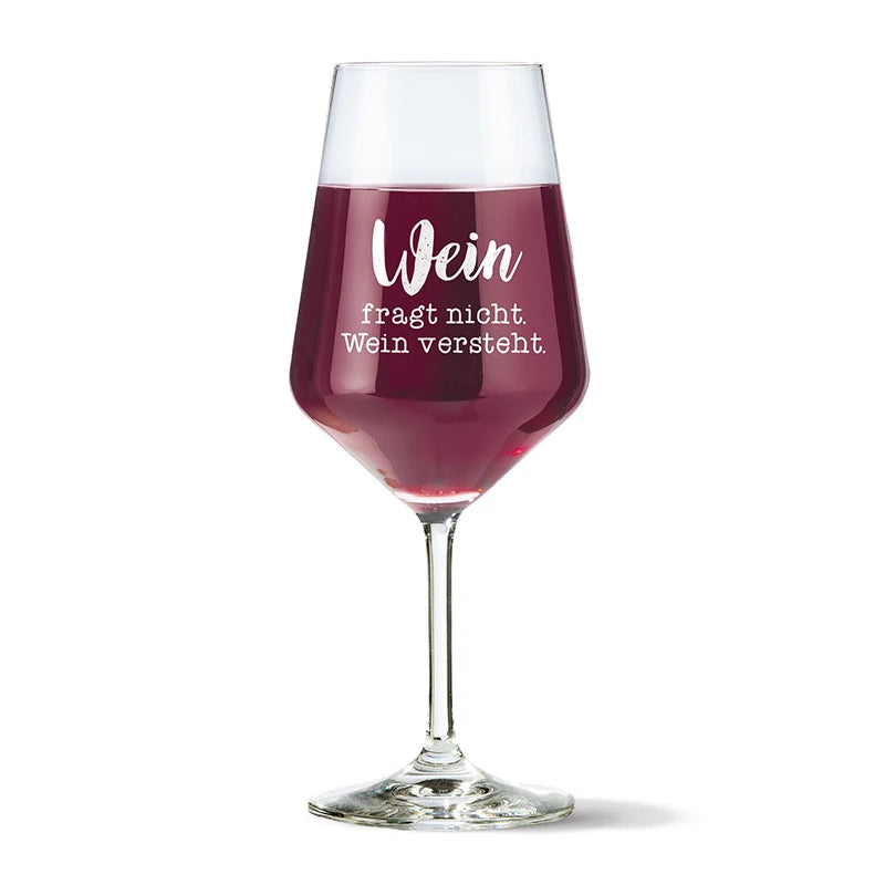 Weinglas mit Spruch „Wein fragt nicht. Wein versteht.“