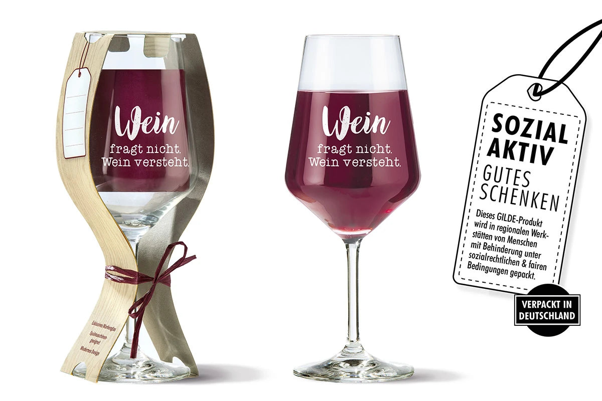Weinglas mit Spruch „Wein fragt nicht. Wein versteht.“