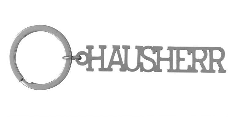 Schlüsselanhänger mit Schriftzug - Hausherr