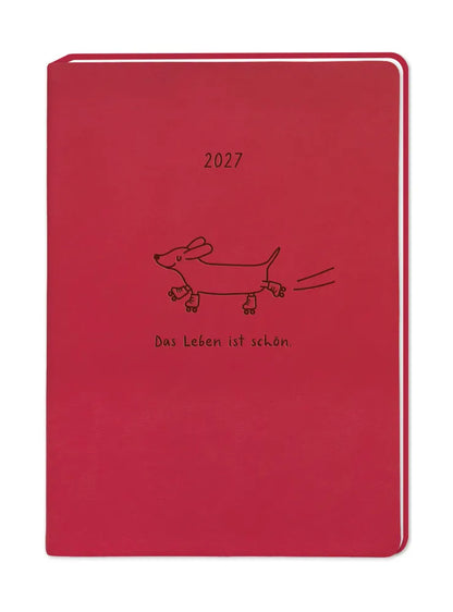 Terminplaner - "Hund" - 2027 - Cover - Text: "2027 Das eben ist schön" Design: gezeichneter Hund in Rollschuhen