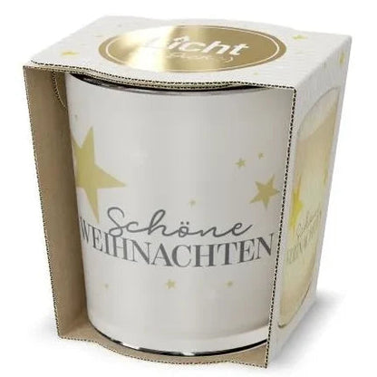 Weißes Windlicht mit goldfarbenen Sternen und Schriftzug „Schöne Weihnachten“ in offener weißer Geschenkverpackung