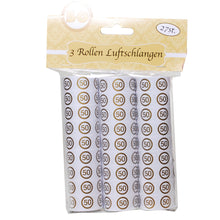 Luftschlangen in gold mit "50"-Aufdruck