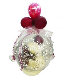 Geschenkballon in bourdeaux und creme verpackt in Folie zur Hochzeit