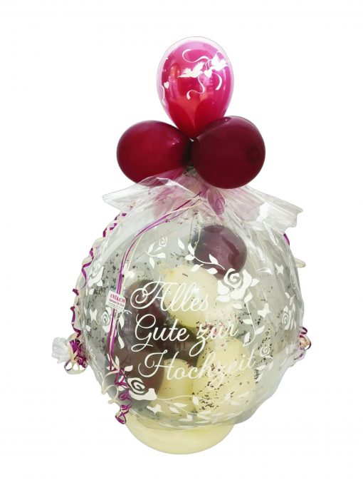 Geschenkballon in bourdeaux und creme verpackt in Folie zur Hochzeit