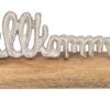 Silberner Metall-Schriftzug "Willkommen" auf Holz-Standfuß